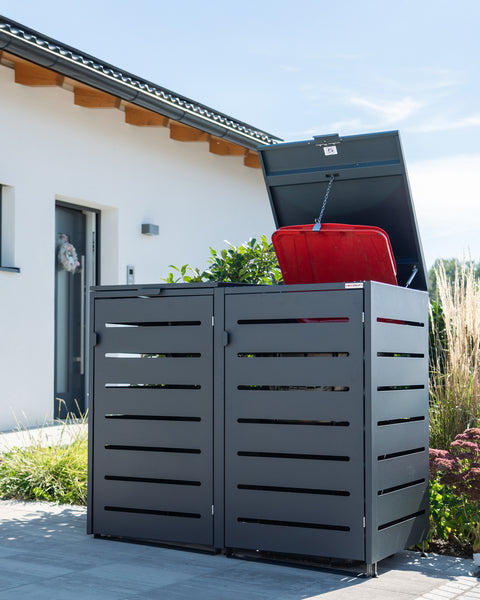 Mülltonnenbox von BIO Stefan vor einem modernen Haus.
