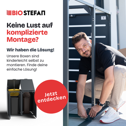 Mand monterer BIO Stefan skraldespandsskab ved siden af reklame tekst.