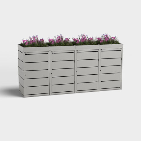 Mülltonnenbox Dagobert 4 240L RAL9007 mit Pflanzdach und pinken Blumen.