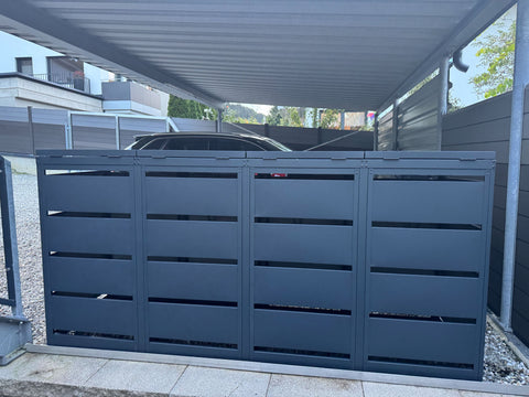 BIO Stefan Dagobert Mülltonnenbox 4er 120l in Anthrazit unter Carport vor modernem Haus