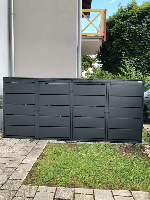 BIO Stefan Dagobert Mülltonnenbox 4er 240l in Anthrazit vor Hauswand auf Terrasse installiert