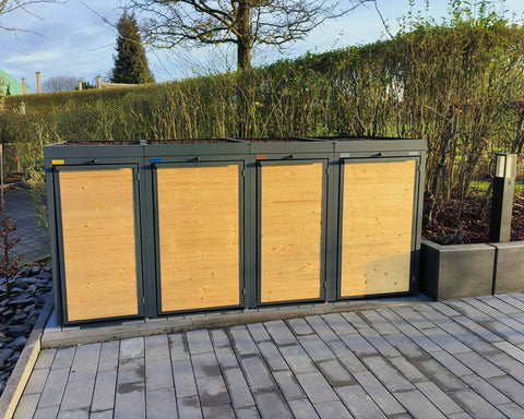 BIO Stefan Holzmichl Mülltonnenbox 4er 120l anthrazit mit Holzfront und Pflanzdach in moderner Einfahrt