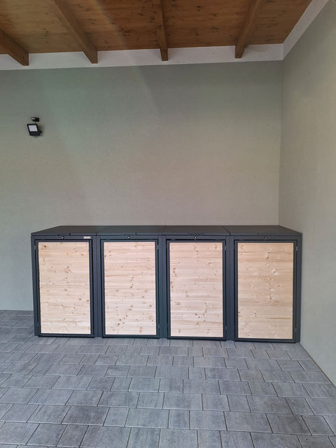 BIO Stefan Holzmichl Mülltonnenbox 4er 240l, anthrazit mit Holzfront, unter überdachter Einfahrt