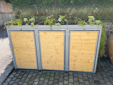 Mülltonnenbox Holzmichl 3er mit Pflanzdach - Montage im Gefälle