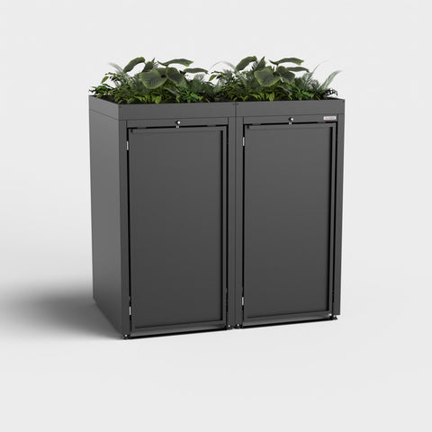 Schwarze Stahlfred-Mülltonnenbox mit Pflanzdach im minimalistischen Design.