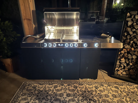 Miele Dreams on the Chalet Terrace: Grill, Cooktop and Storage in Black with Mountain Views